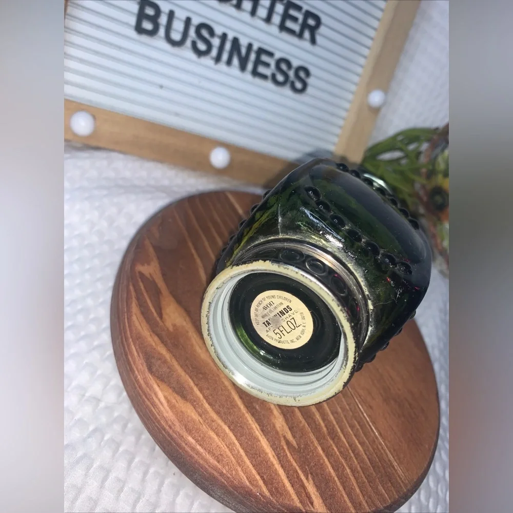Unique vintage Avon collectible bottle designed in the shape of a lantern.